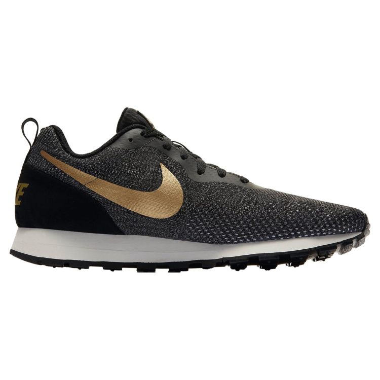 Nike md runner gold clearance